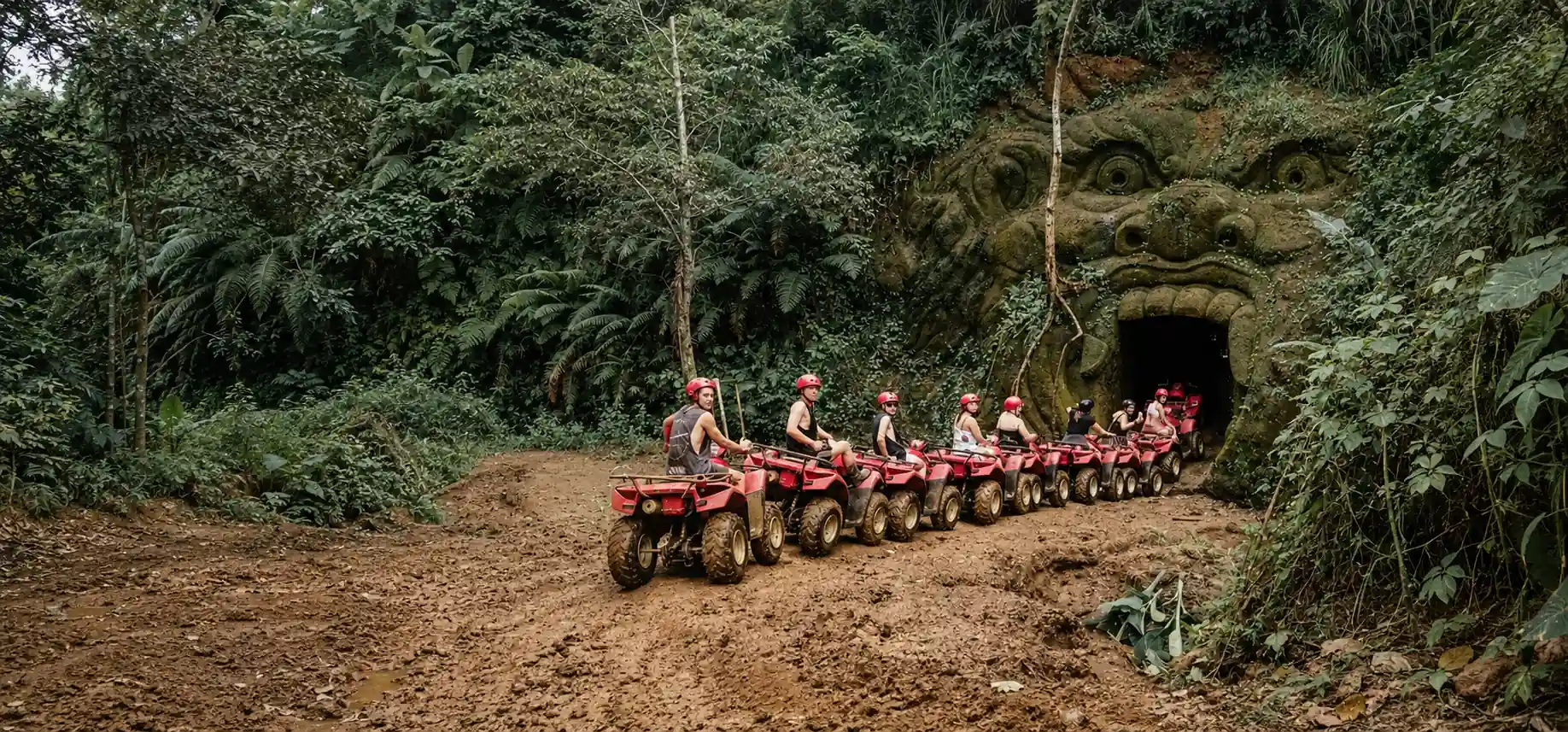 ATV riders entering the gorilla cave route on a Bali jungle track